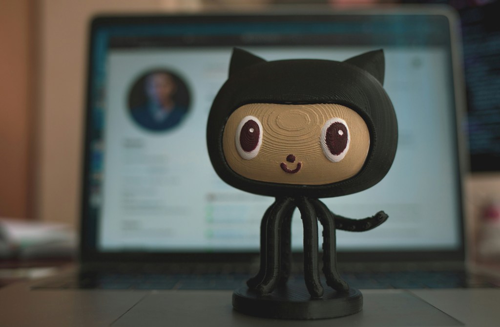 Screenshot of the GitHub Copilot app interface showing code, issues, and agents.