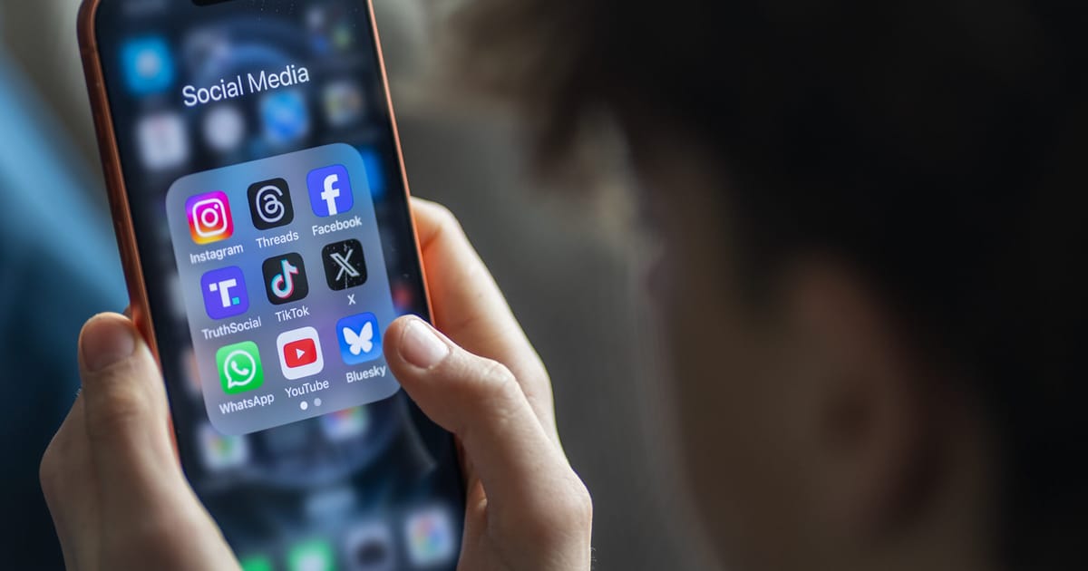 EU Parliament chamber with lawmakers gesturing angrily amid US and EU flags